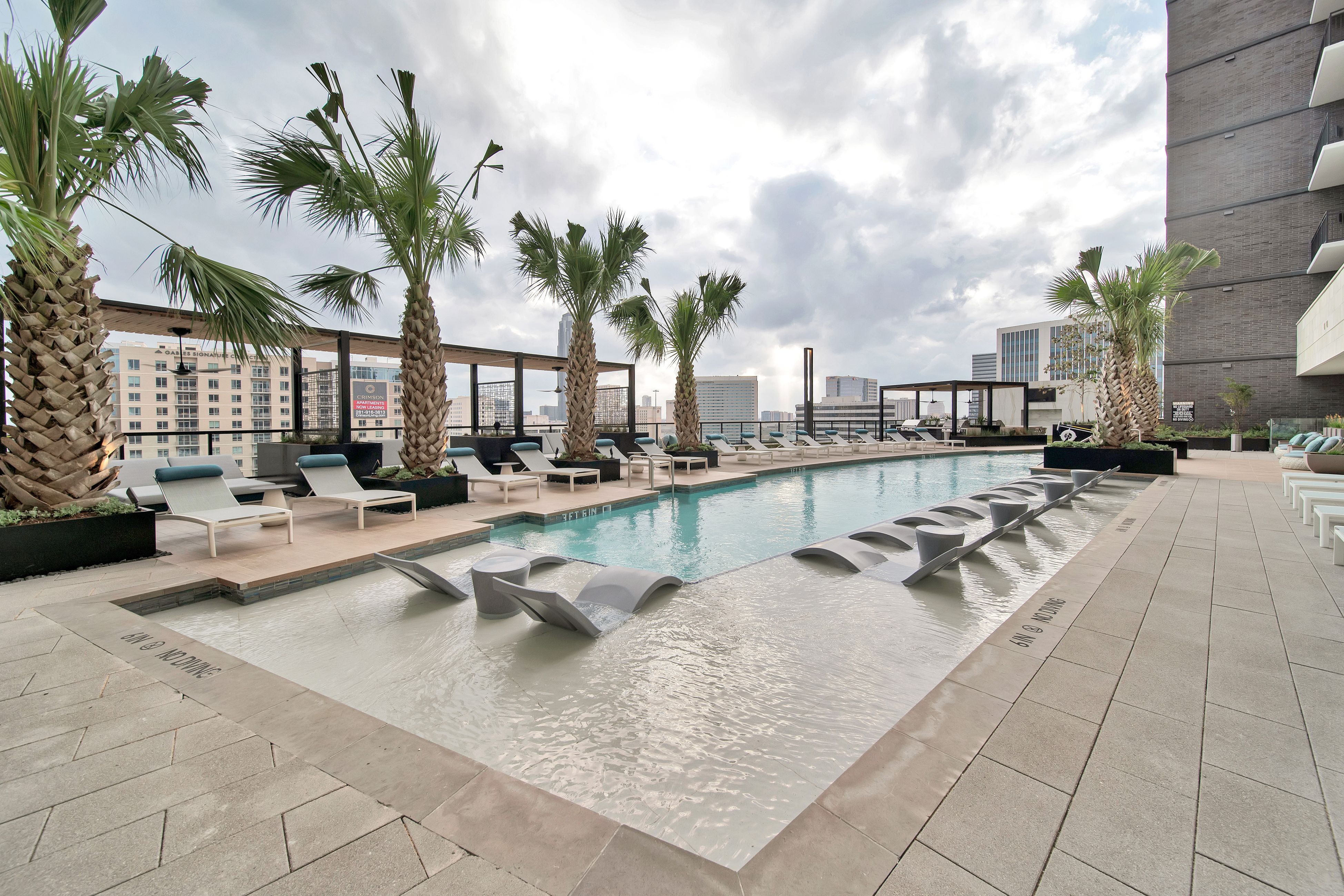 Bowen luxury pool with Houston skyline views